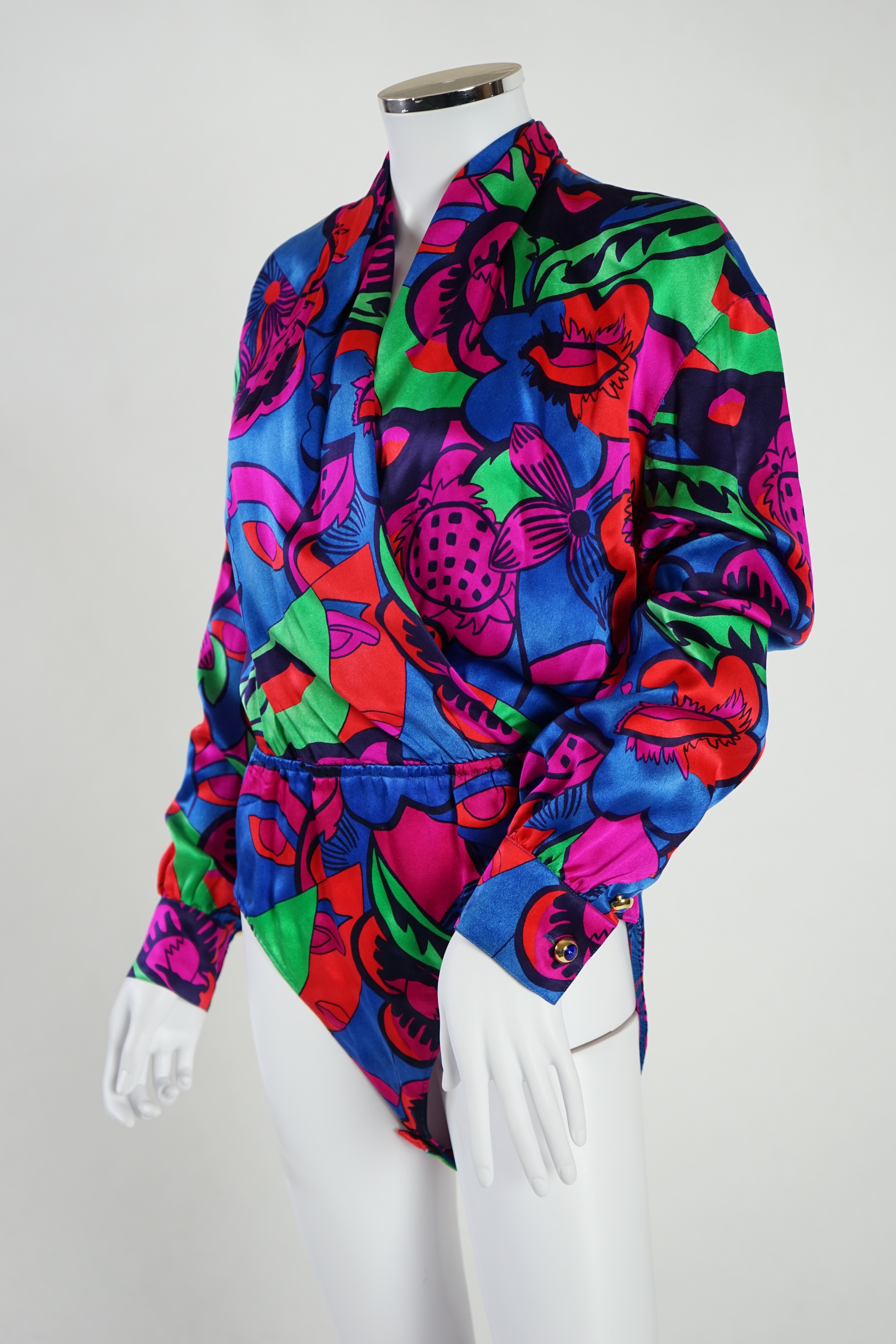 Two Escada skirts and a multi colour silk body blouse. Proceeds to Happy Paws Puppy Rescue